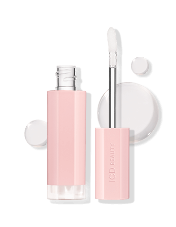 Riman ICD Beauty Glow Up Lip Oil in pink packaging, with applicator, showcasing a moisturizing lip treatment.
