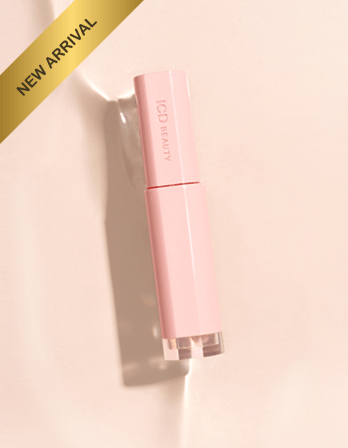 Riman ICD Beauty Glow Up Lip Oil, a moisturizing lip treatment with shine, in a stylish pink package, marked as new arrival.