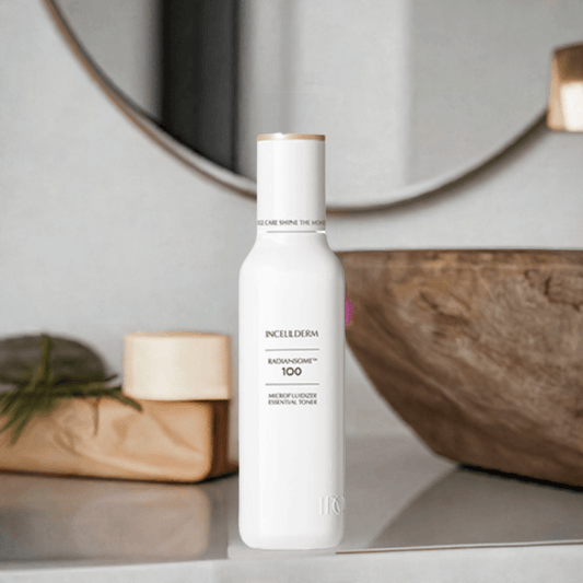 RADIANSOME 100 Microfluidizer Essential Toner in elegant bottle, promoting skin toning and hydration for anti-aging.