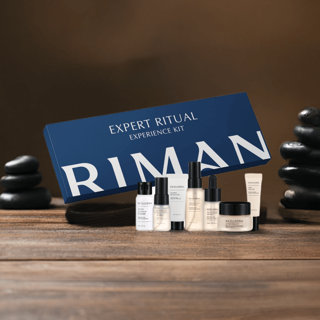Riman Expert Ritual Experience Kit with travel-size skincare products arranged in an elegant gift box on a wooden surface.