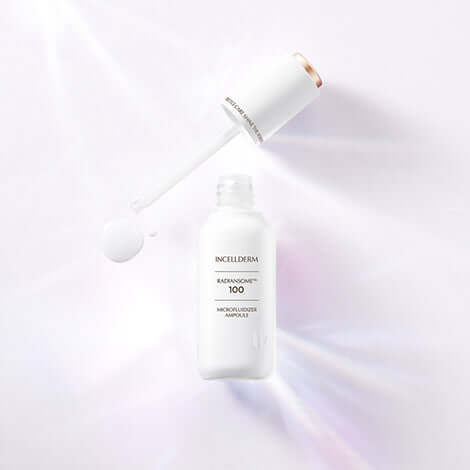 RADIANSOME 100 Microfluidizer Ampoule with dropper, showcasing ultra-hydrating formula for skin elasticity and glow.