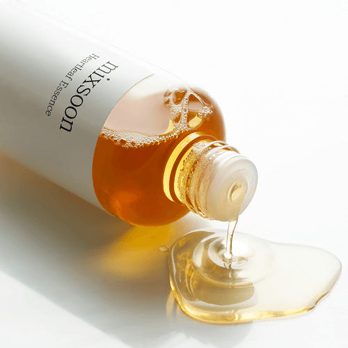 mixsoon Heartleaf Essence bottle with essence dripping, promoting Korean glass skin, hydrating and soothing skin.