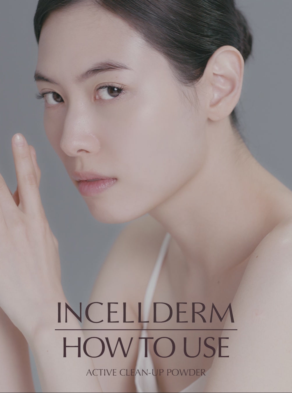 Young woman demonstrating how to use Riman Incellderm Active Clean-up Powder for radiant skin.