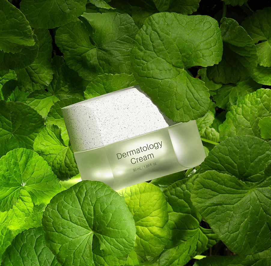 Riman ICD Dermatology Cream displayed among lush green leaves, highlighting its natural ingredients and skincare benefits.