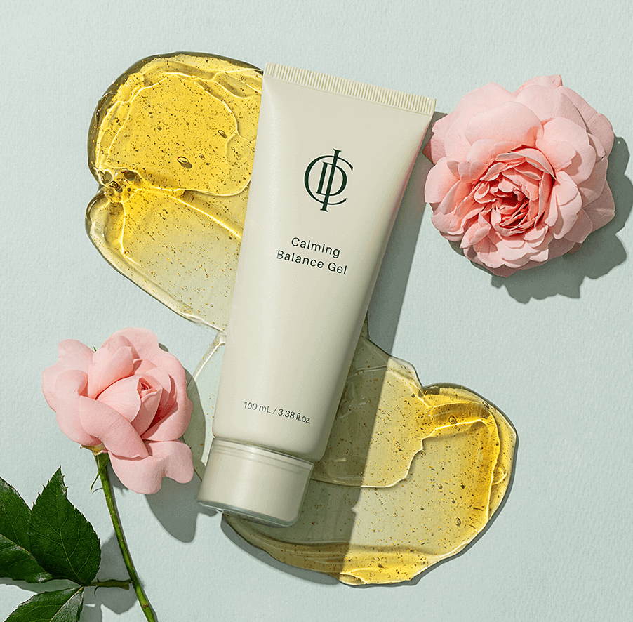 Riman ICD Calming Balance Gel tube with rose petals and gel on a soft green background.