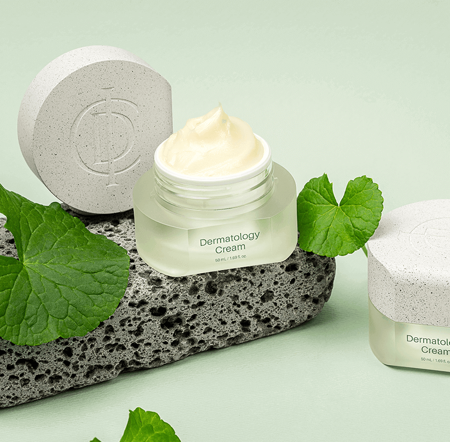 Riman ICD Dermatology Cream in a jar with a light green background and leaves, showcasing skincare benefits.