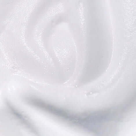 Close-up of Riman Incellderm Snow Enzyme Cleanser EX, a light, creamy texture that foams for gentle cleansing.