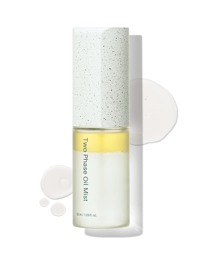 Riman Two Phase Oil Mist with speckled cap for hydration and nourishment in skincare routine.