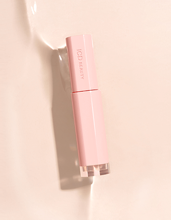Riman ICD Beauty Glow Up Lip Oil in pink packaging, perfect for moisturizing and high-shine lip care day or night.