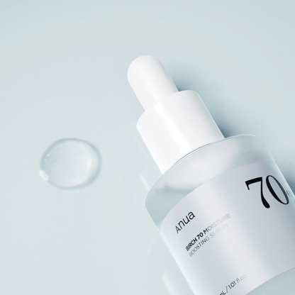 Anua Birch 70 Moisture Boosting Serum in a sleek glass bottle with dropper, showcasing moisture-boosting benefits.