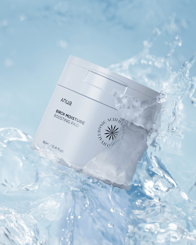 Anua Birch Moisture Boosting Pad in water, showcasing hydration benefits and gentle toner pad design.