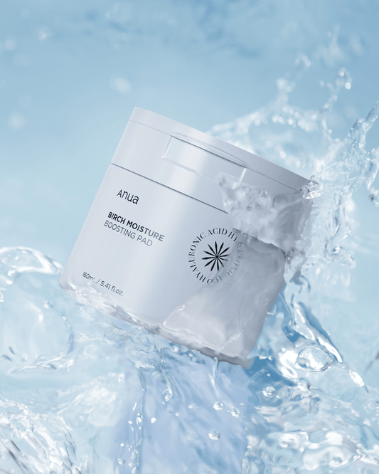 Anua Birch Moisture Boosting Pad in water, showcasing hydration benefits and gentle toner pad design.
