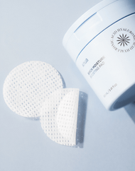 Anua Birch Moisture Boosting Pad with two toner pads on a light background, promoting hydration and skin balance.