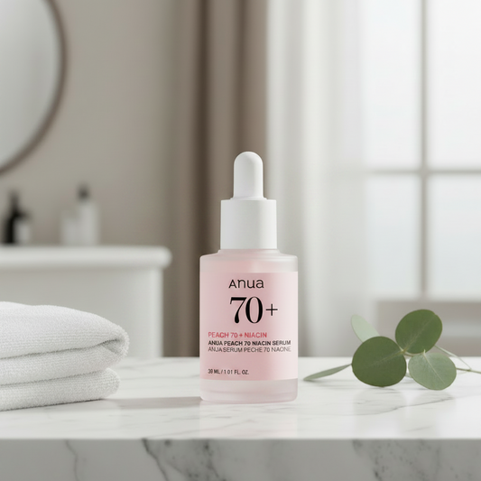 Anua Peach 70 Niacin Serum bottle with dropper, designed to brighten and smooth skin for a refreshed look.