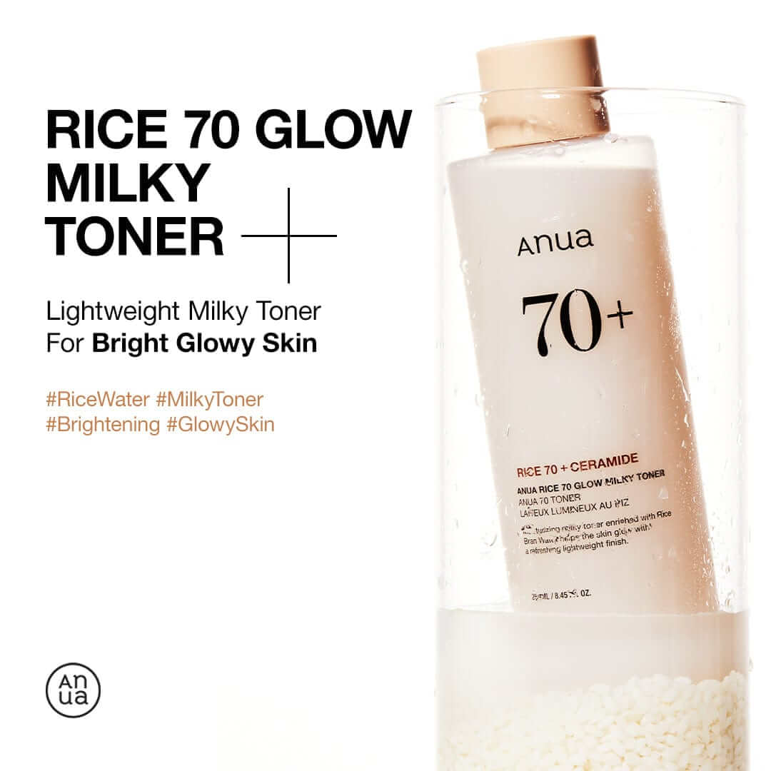 Anua Rice 70 Glow Milky Toner bottle placed in rice, promoting bright glowy skin with lightweight formula.