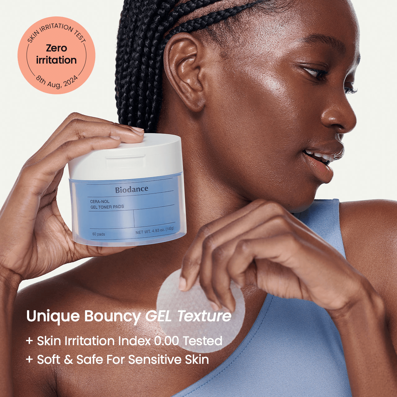 Biodance Cera-nol Gel Toner Pads in a round container held by a woman, promoting hydration and sensitivity for skin.