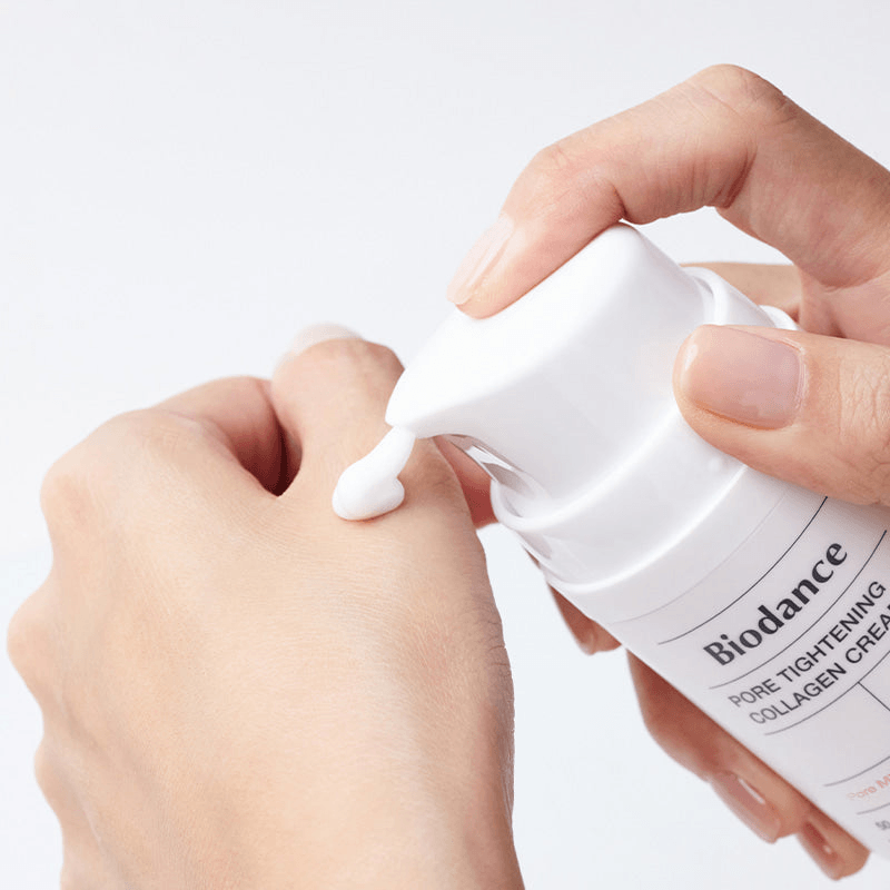 Biodance Pore Tightening Collagen Cream being applied on hand to show its texture and consistency.