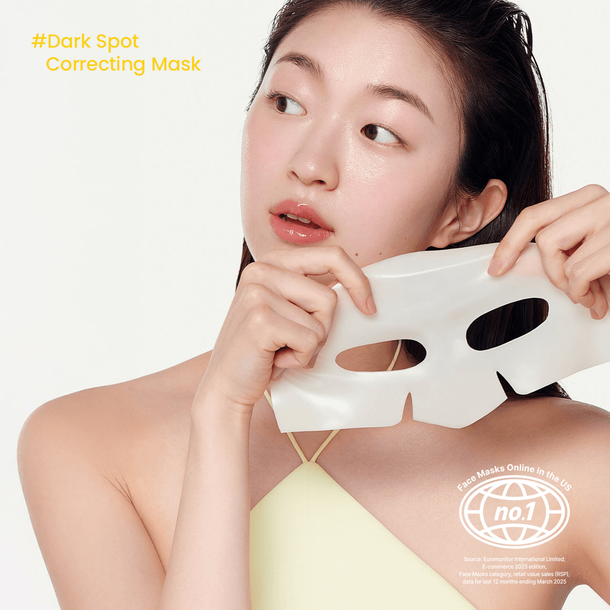 Biodance Radiant Vita Niacinamide Real Deep Mask dark spot correcting treatment in use by a woman with glowing skin.