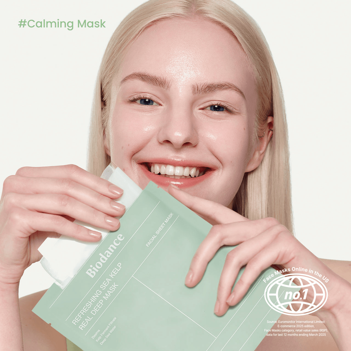 Biodance Refreshing Sea Kelp Real Deep Mask held by a smiling woman, showcasing Korean skincare products.