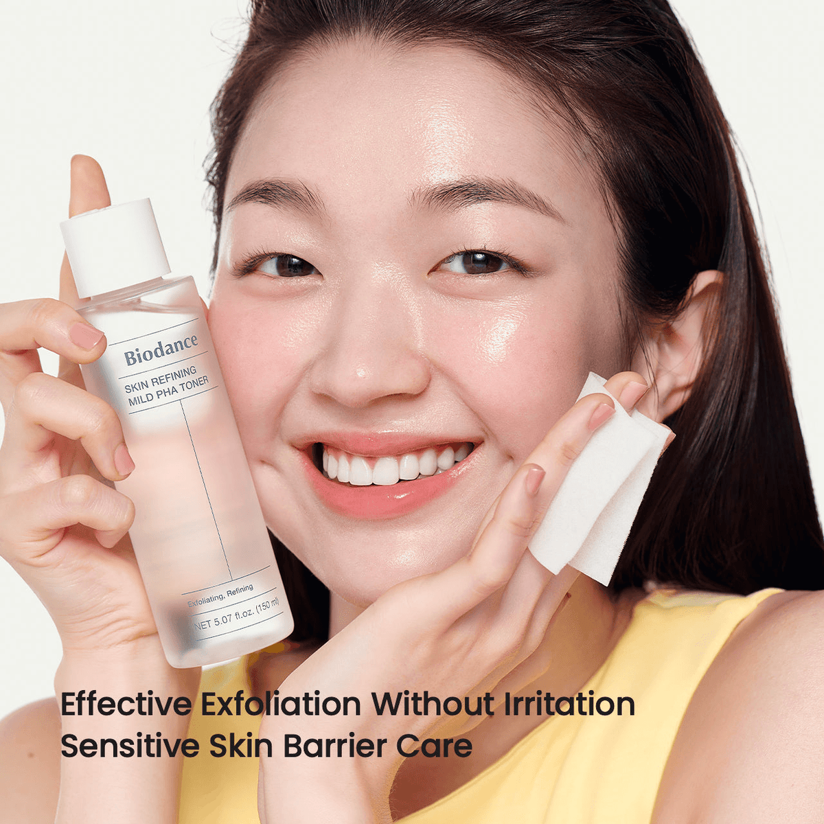 Biodance Skin Refining Mild PHA Toner being applied by a smiling woman for effective exfoliation and sensitive skin care.