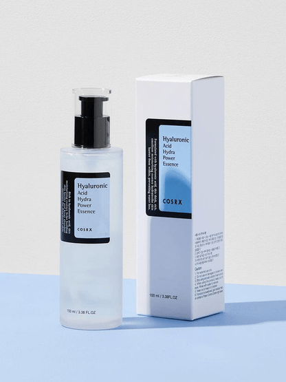 COSRX Hyaluronic Acid Hydra Power Essence in a clear bottle with a pump and box, ideal for moisturizing skin.
