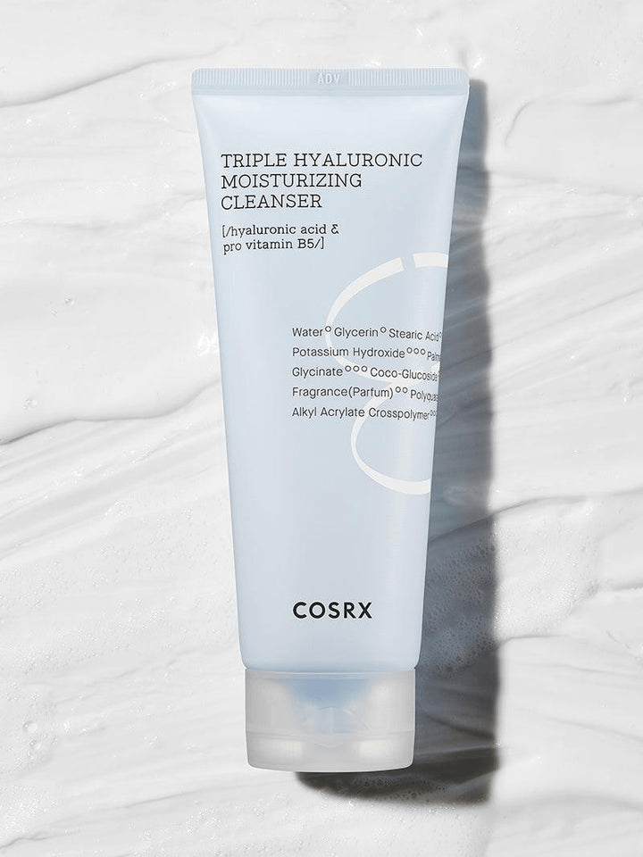 COSRX Triple Hyaluronic Moisturizing Cleanser tube against a textured white background