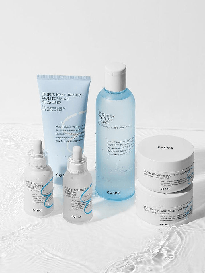 COSRX Triple Hyaluronic Moisturizing Cleanser and skincare products on a white surface