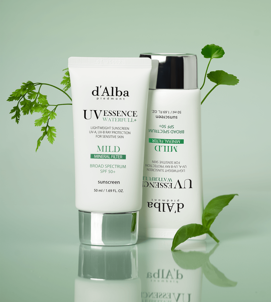 d'Alba White Truffle Waterfull Mild Sunscreen SPF 50 and UV Essence Waterfull packaging with green background.
