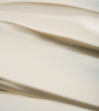 Creamy texture of d'Alba White Truffle Waterfull Mild Sunscreen SPF 50, showcasing its lightweight formula.