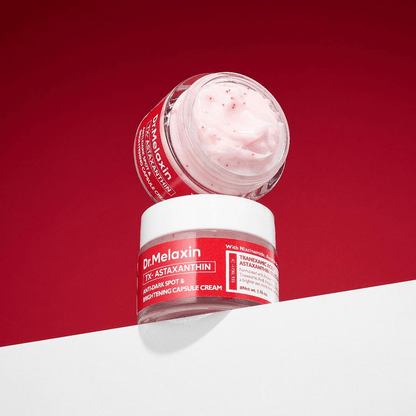 Dr Melaxin TX-Astaxanthin Anti-Dark Spot and Brightening Capsule Cream on a red background.