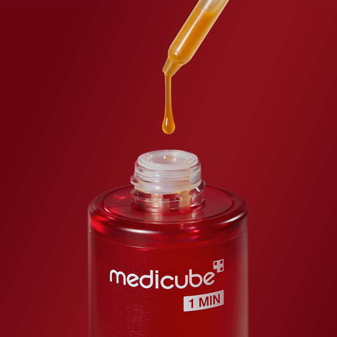 Medicube 21% Red Succinic Acid Cleansing Booster Serum dropper dispensing serum
