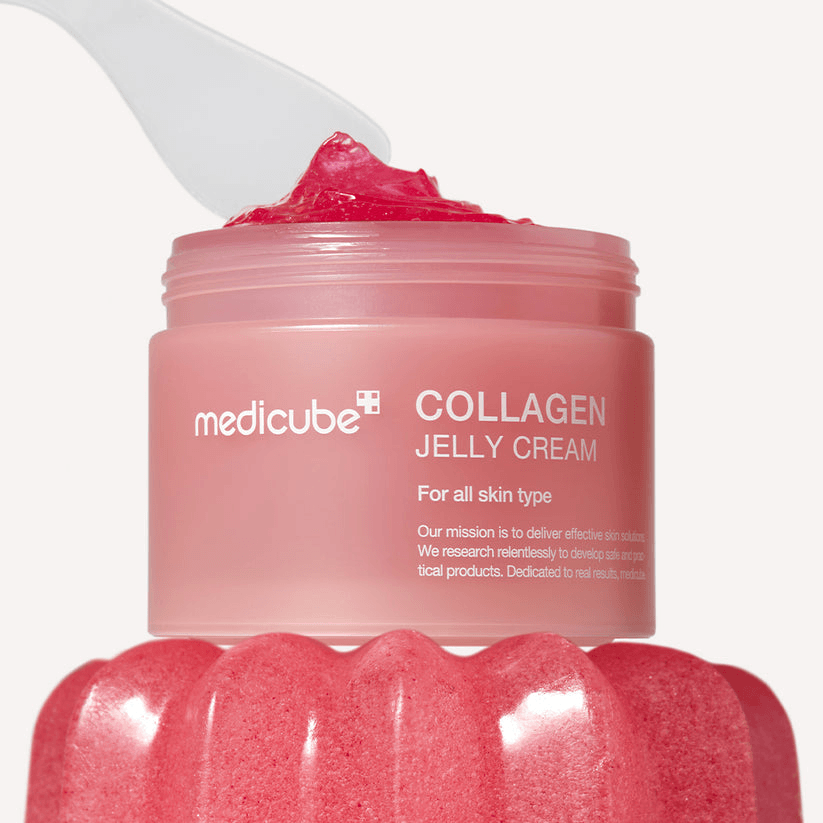Medicube Collagen Niacinamide Jelly Cream in a pink jar with a spatula, promoting smooth and hydrated skin.