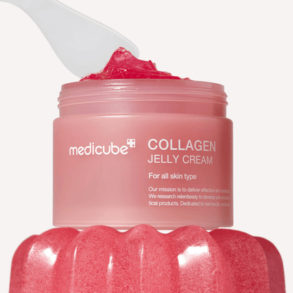 Medicube Collagen Niacinamide Jelly Cream in a pink jar with a spatula, promoting smooth and hydrated skin.