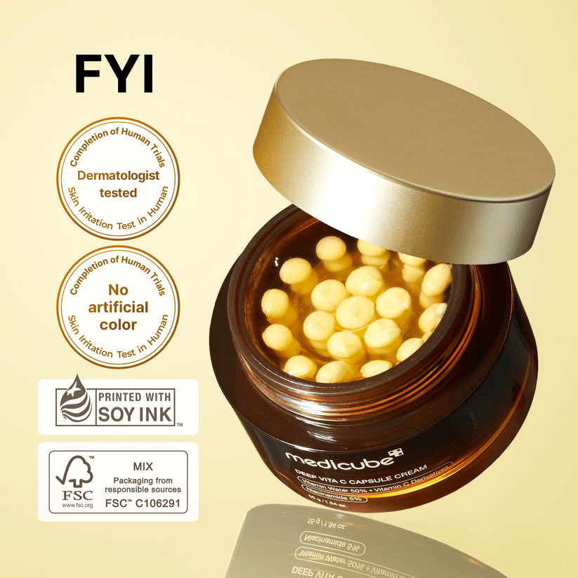 Medicube Deep Vita C Capsule Cream in a jar with a golden lid, showcasing capsules for brightening skin.