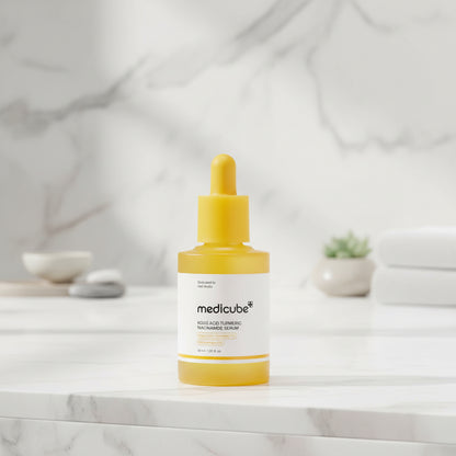 Medicube Kojic Acid Turmeric Capsule Serum in a bright yellow bottle with dropper, promoting skin brightening.