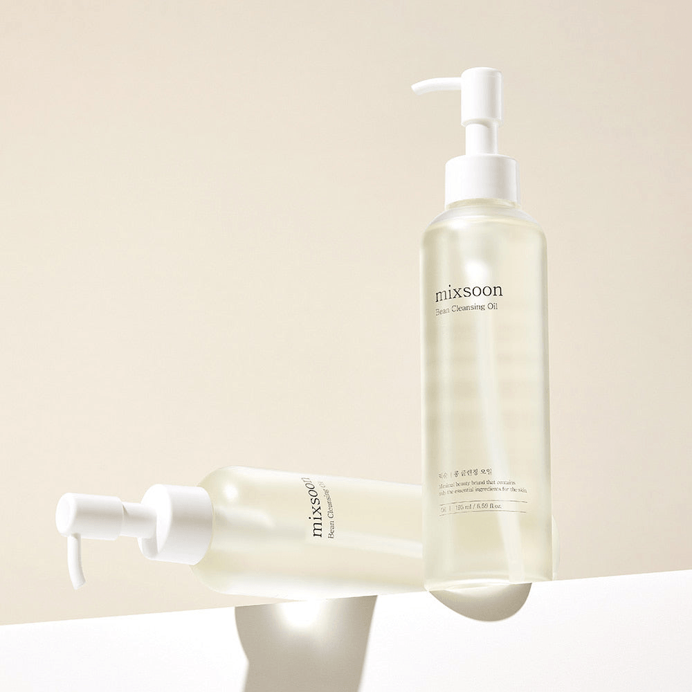 mixsoon Bean Cleansing Oil bottles on a sleek surface, showcasing a lightweight formula for healthy skin.