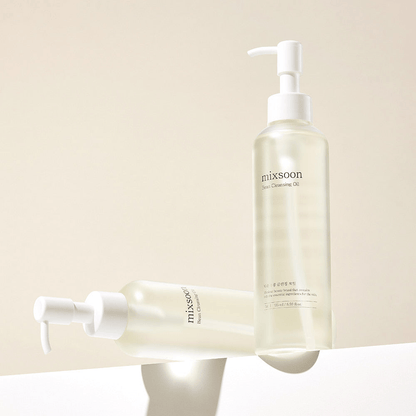 mixsoon Bean Cleansing Oil bottles on a sleek surface, showcasing a lightweight formula for healthy skin.
