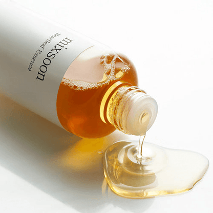 mixsoon Heartleaf Essence bottle with essence dripping, promoting Korean glass skin, hydrating and soothing skin.