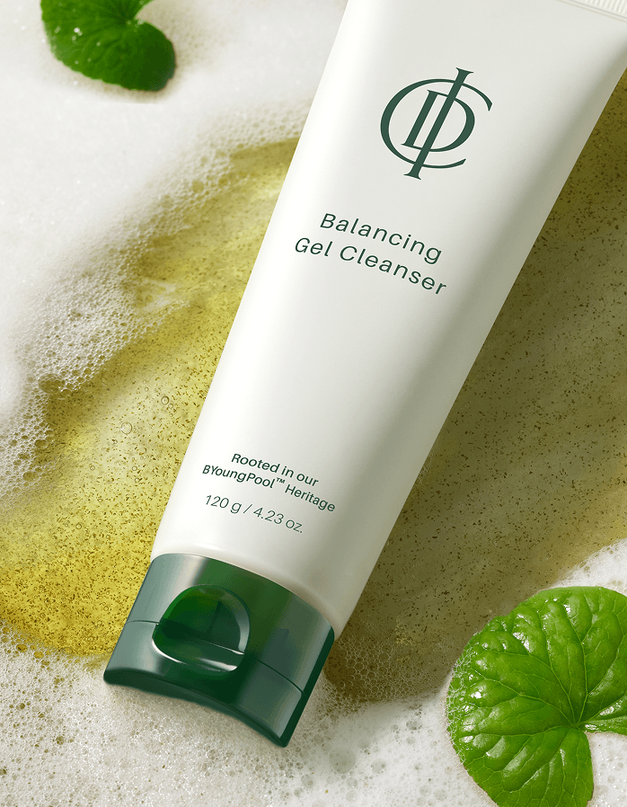 RIMAN ICD Balancing Gel Cleanser tube on a soft background with bubbles and mint leaves.