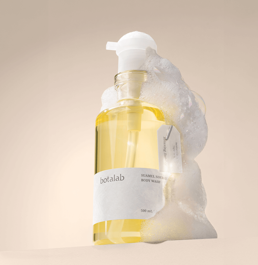 Suamel Nourishing Body Wash by Botalab in a bottle with bubbles, showcasing hydration and cleansing benefits.