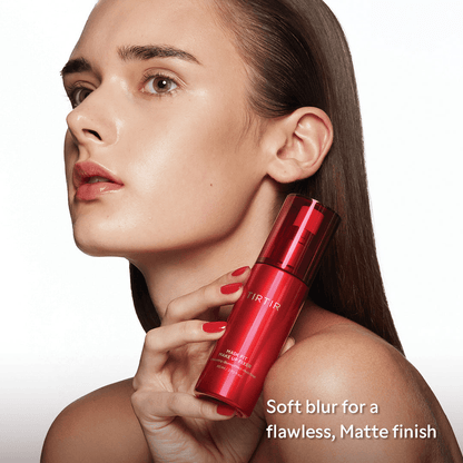 Model showcasing TIRTIR Mask Fit Makeup Fixer spray with a flawless, matte finish on her skin.